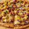 Delicious chicken pizza topped with flavourful ingredients served at Local Takeaway in Sydney